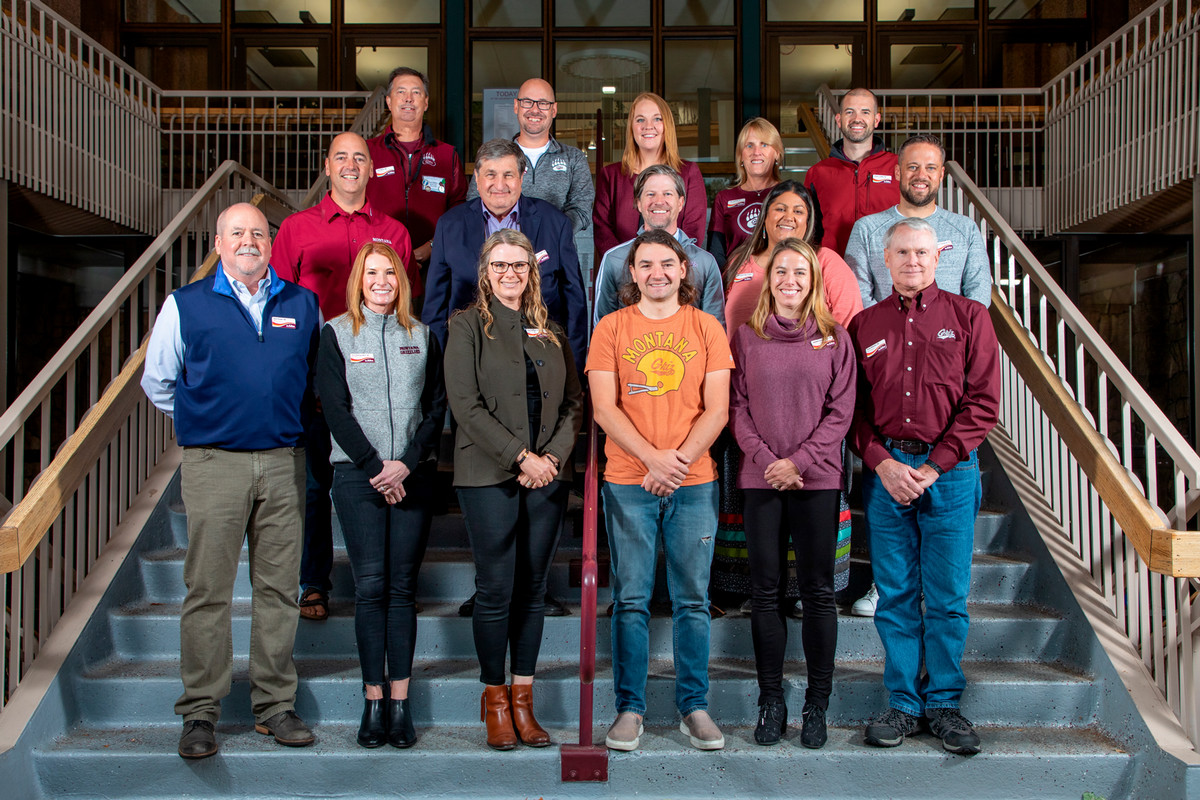 Group photo of the Board of Directors members outside of The University Center steps