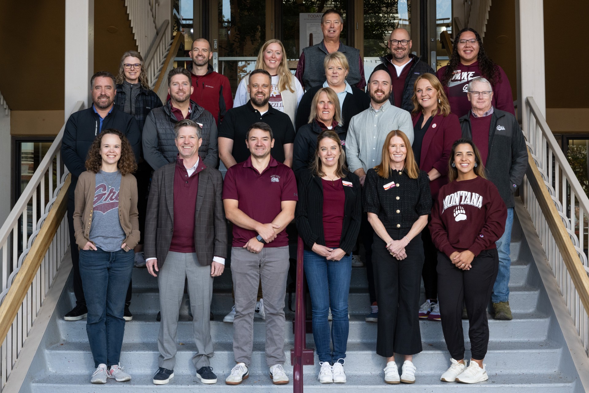 Group photo of the Board of Directors members outside of The University Center steps