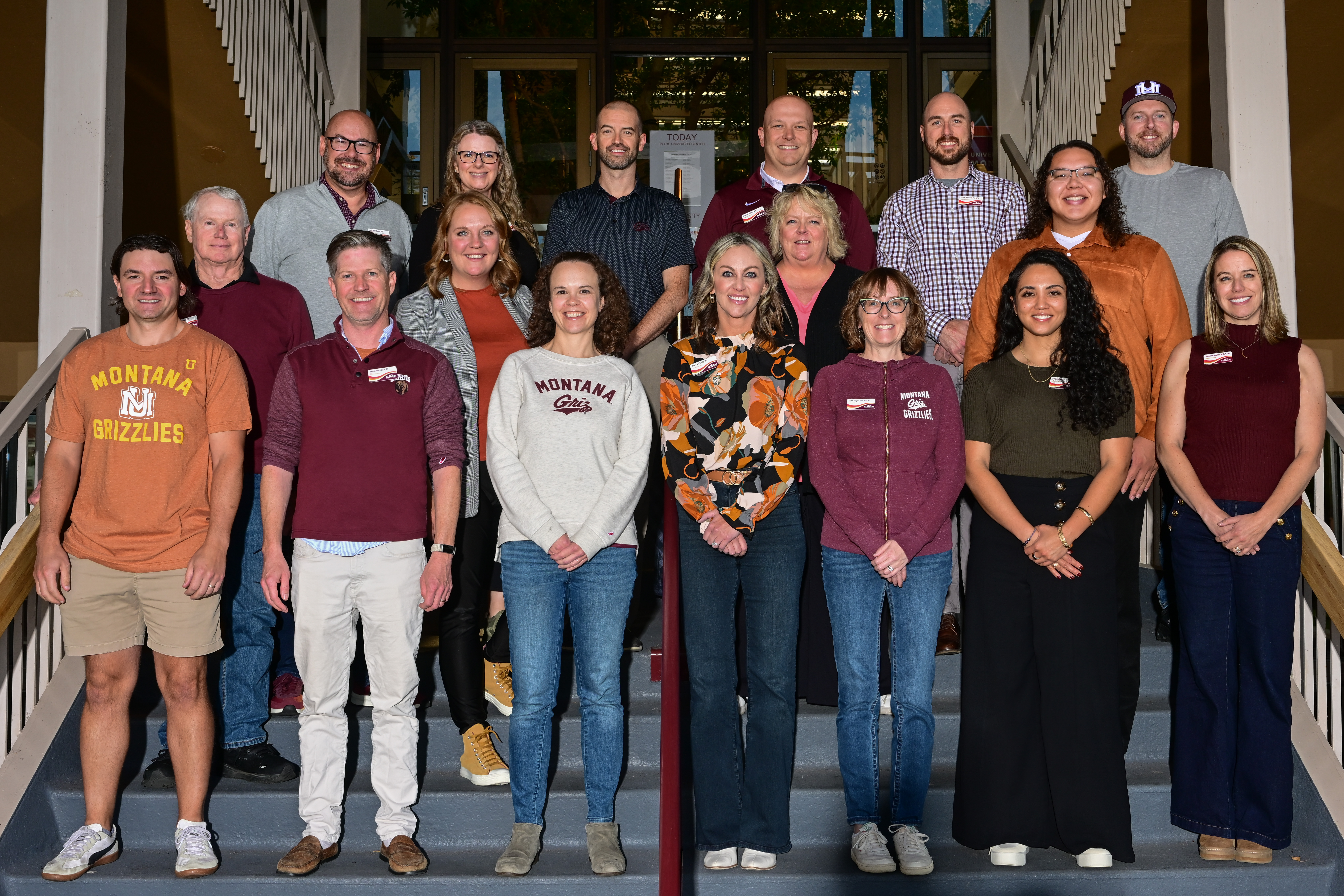 Group photo of the Board of Directors members outside of The University Center steps