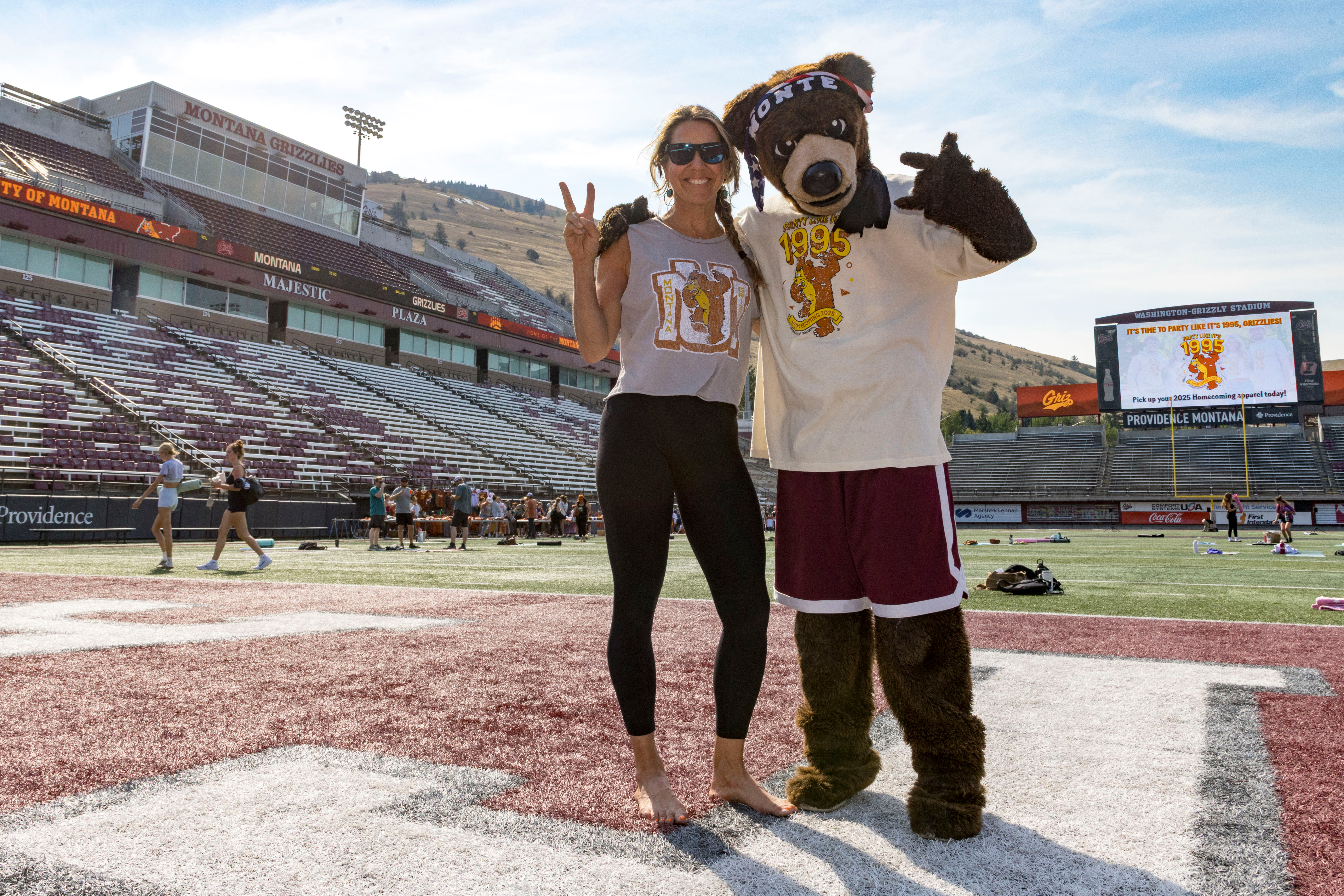 Alley Fontenet poses with Griz mascot Monte.