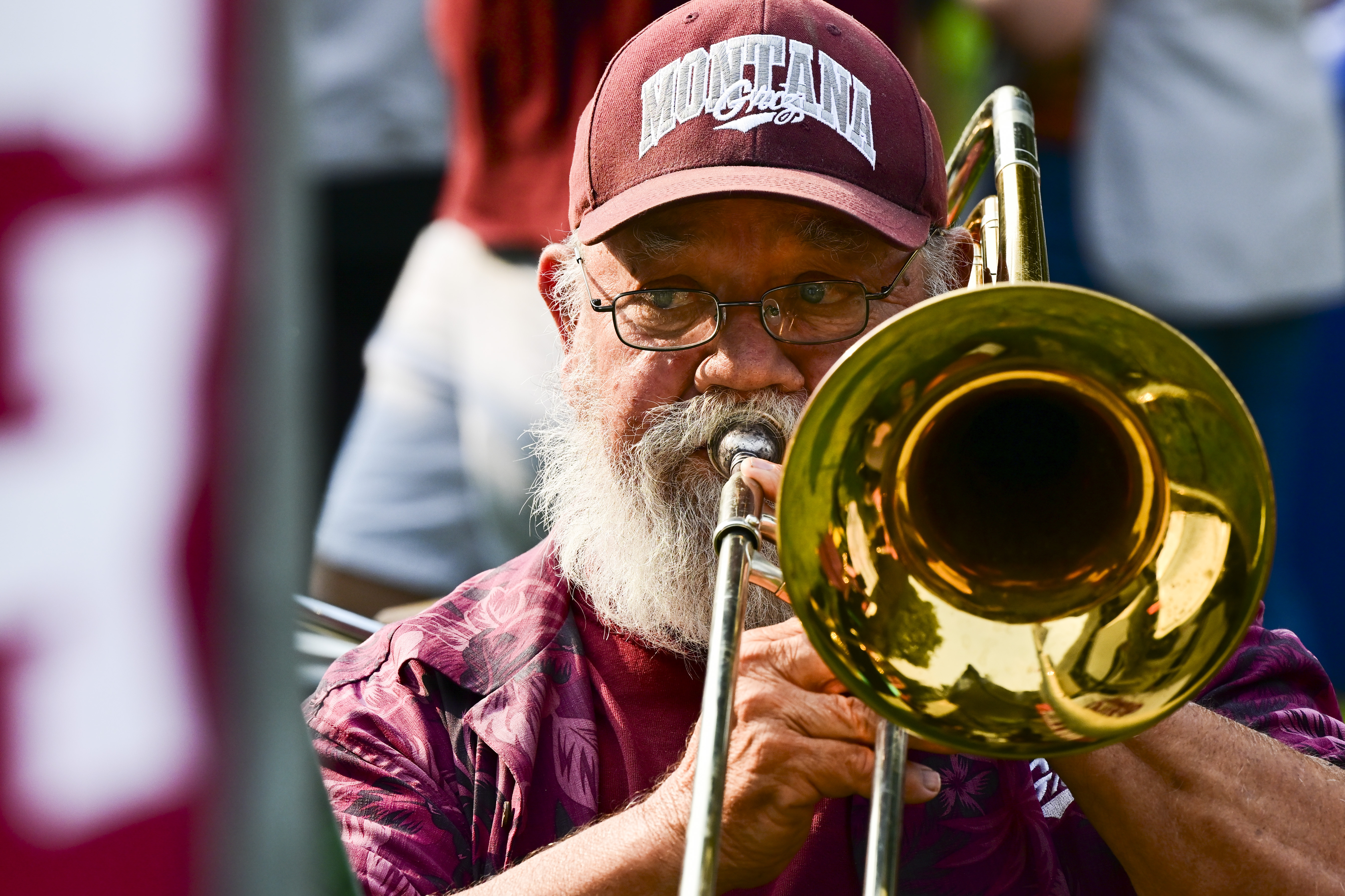 Forty-plus parades, one trombone and endless pride. UM alum Denley Loge continues to 
