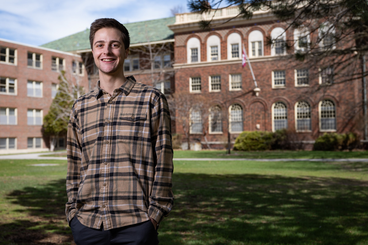 Photo of Luke in front of Brantly Hall.