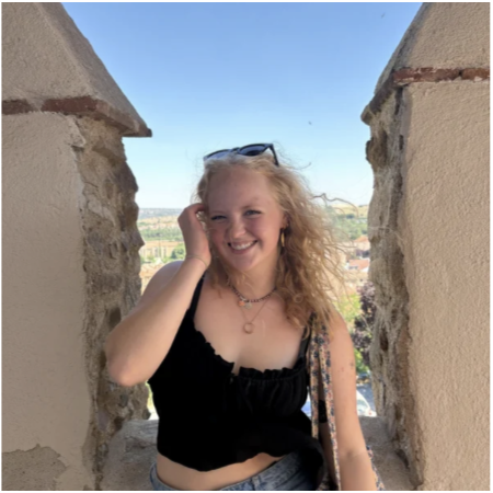 A person smiling at the cameraAI-generated content may be incorrect.